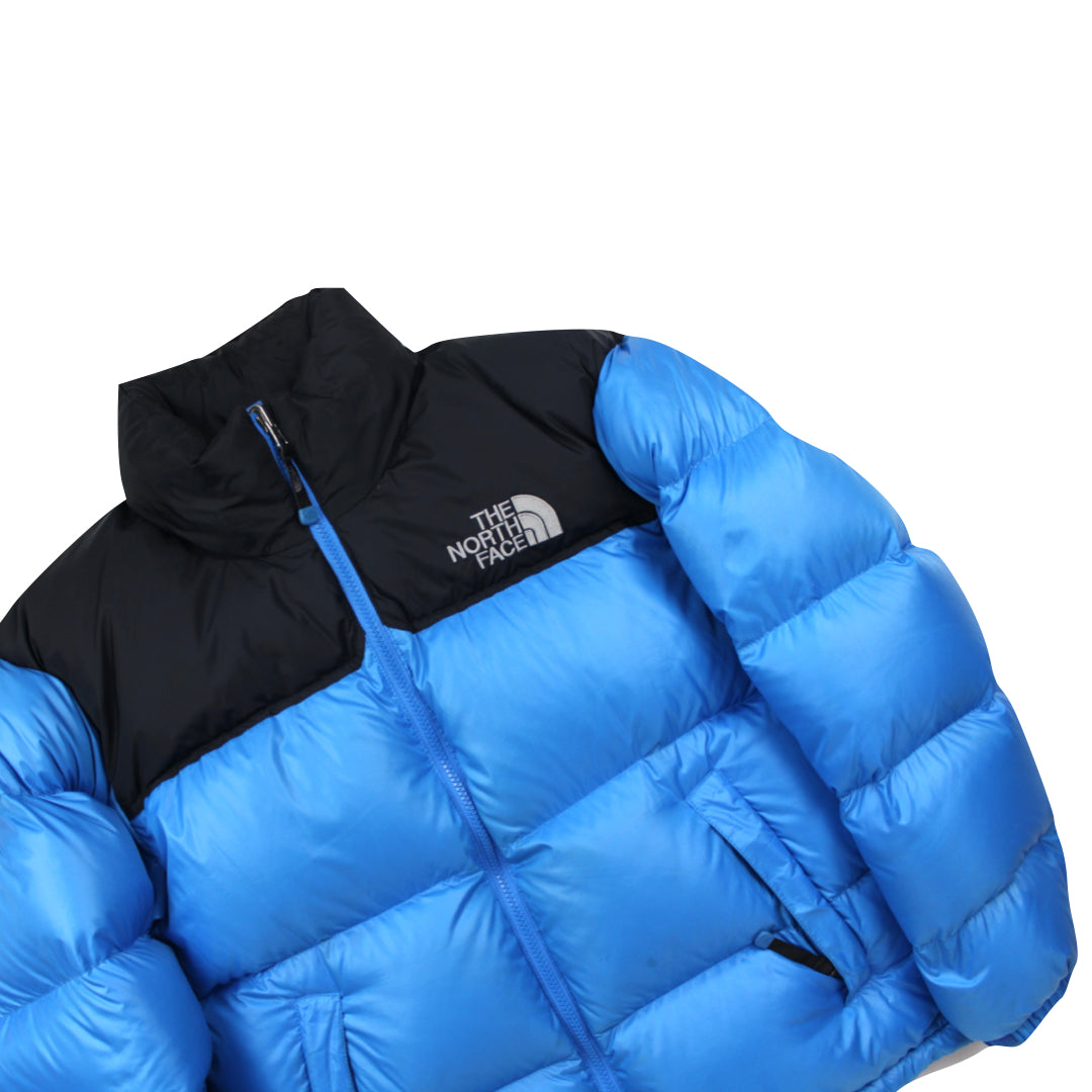 The North Face Baby Blue Puffer Jacket WITH SLIGHT FADED COLOURING