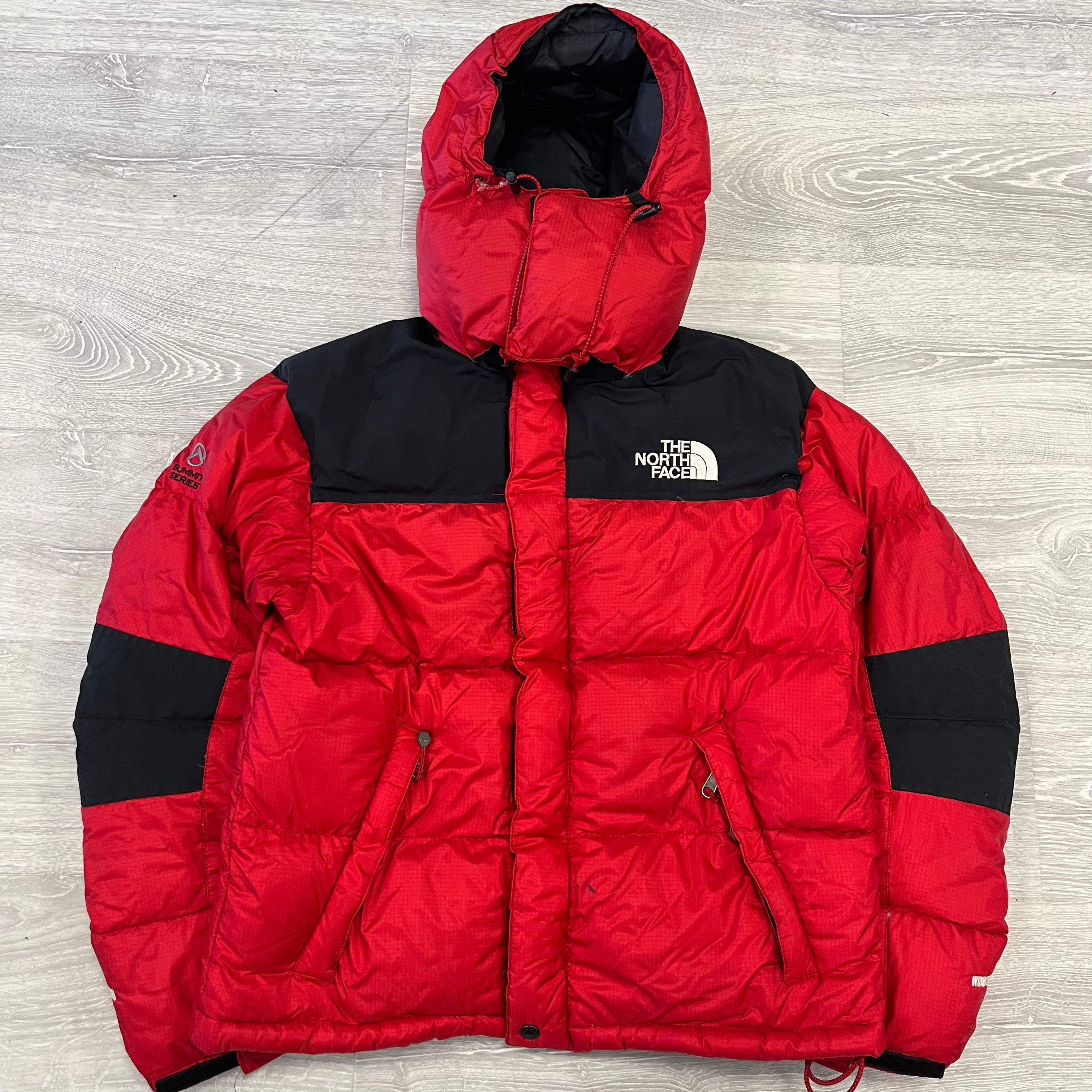 The North Face Red Baltoro Puffer Jacket WITH STAIN