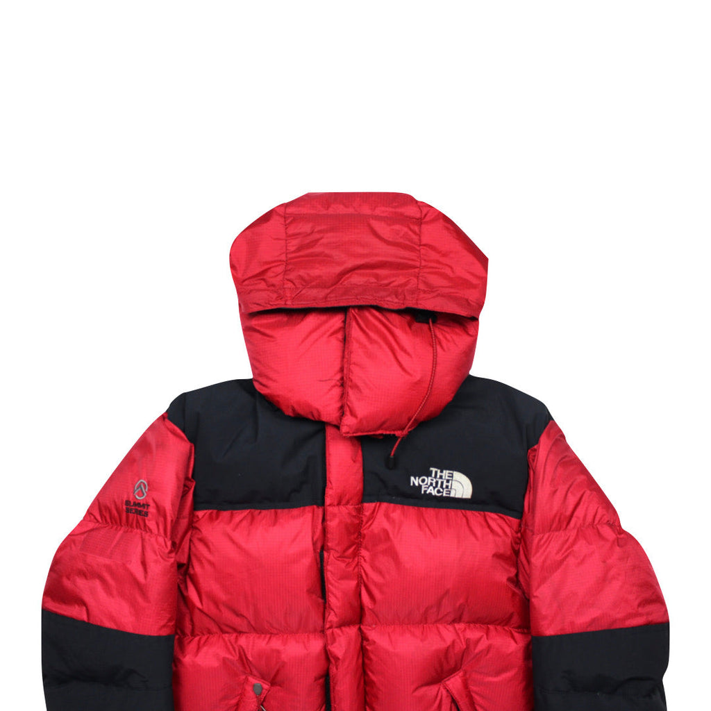 The North Face Red Baltoro Puffer Jacket WITH STAIN