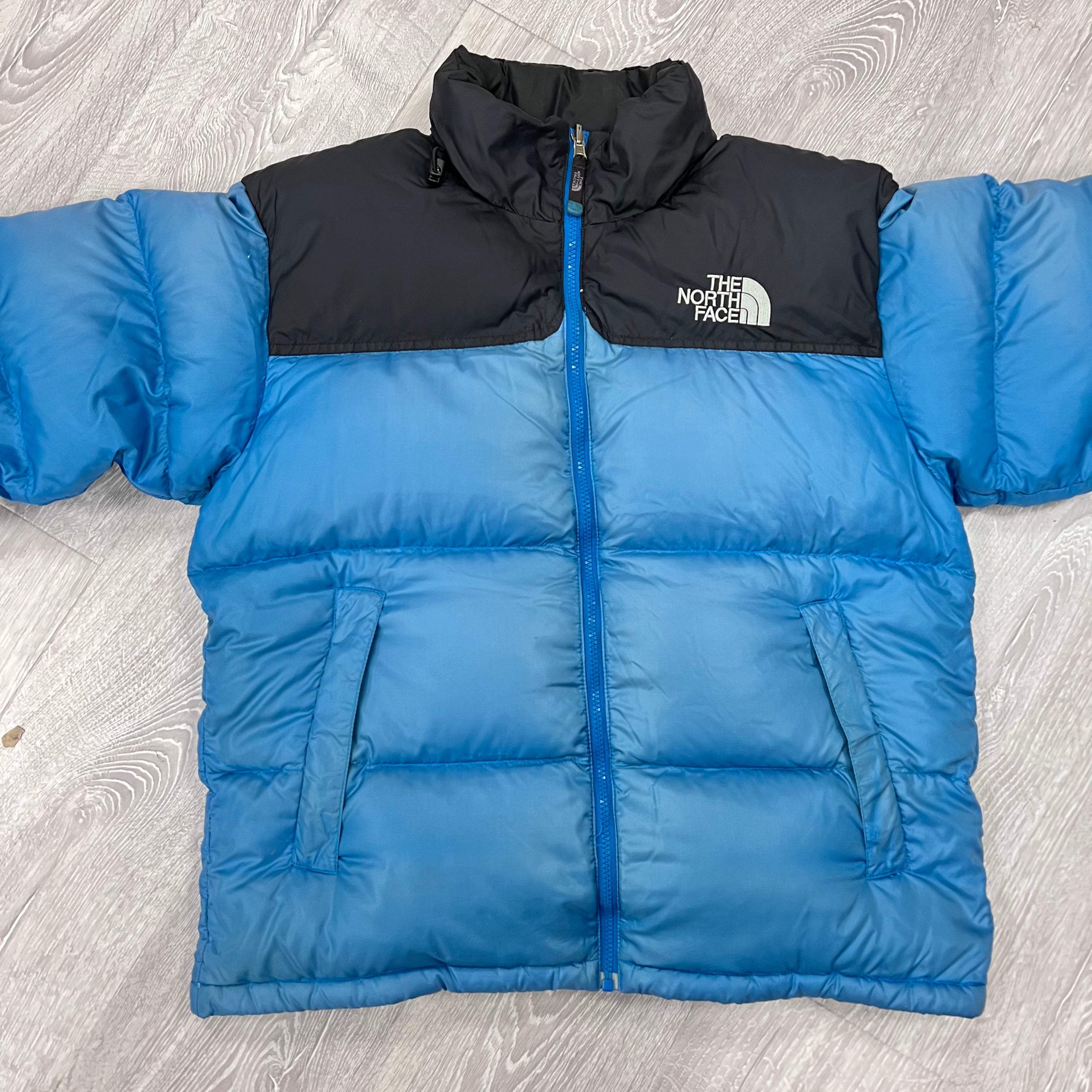 The North Face Baby Blue Puffer Jacket WITH SLIGHT FADED COLOURING